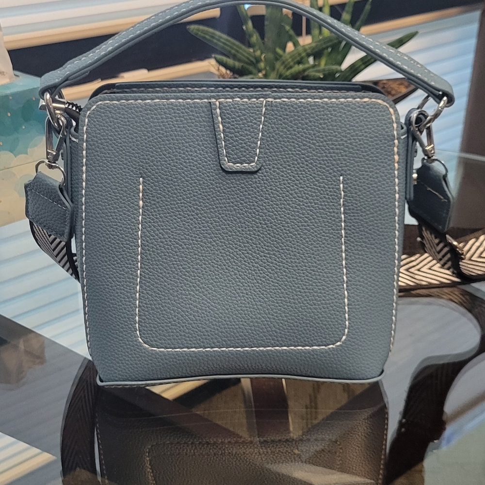 Hand stitched vegan leather purse